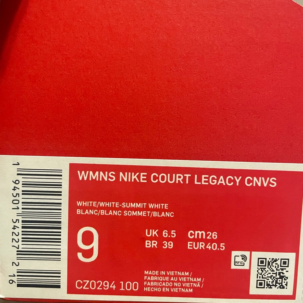 NWT size 9 women 8.5 men white Nike canvas